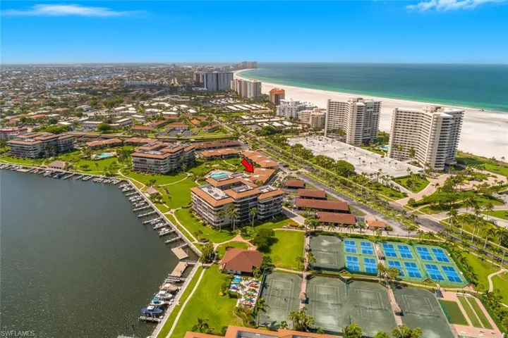 Drone / aerial view of waterfront with a beach