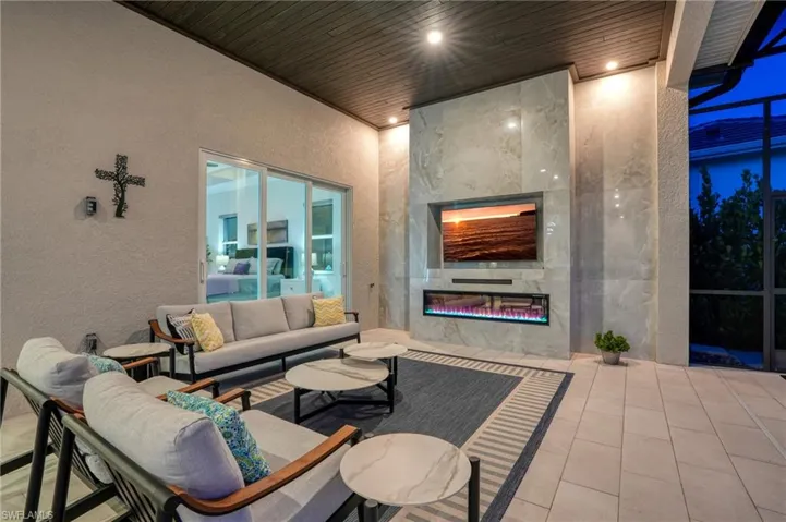View of patio featuring an outdoor hangout area