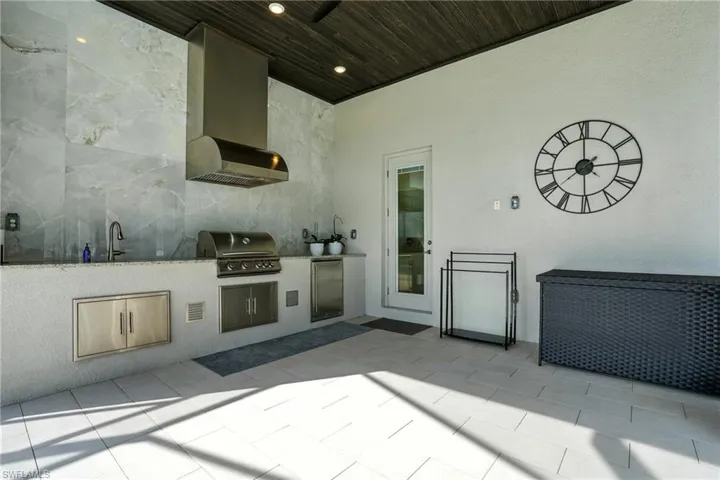 View of patio / terrace with an outdoor kitchen