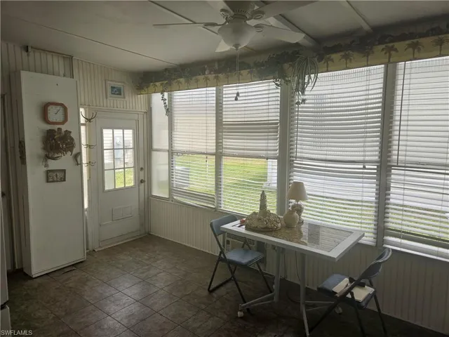Sunroom / solarium featuring visible vents