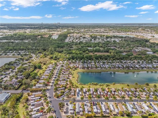 Aerial view of residential area with a large body of water