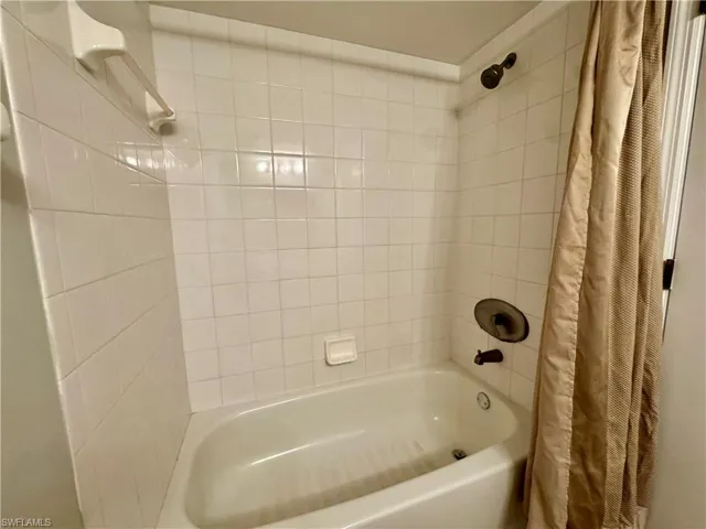Guest Full bath featuring shower / tub combo