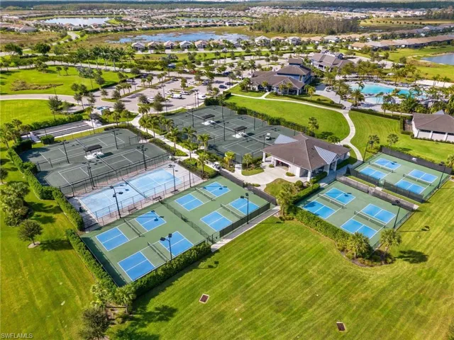 Aerial perspective of suburban area with a large body of water