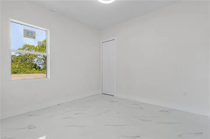 View of tiled spare room