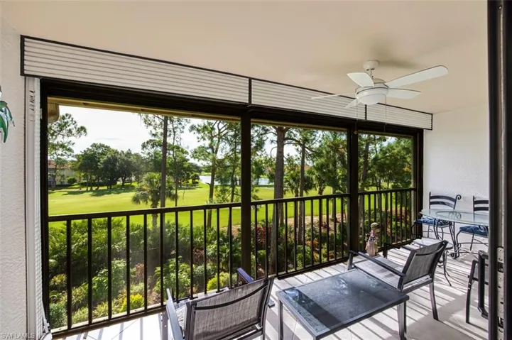 Sunroom featuring ceiling fan