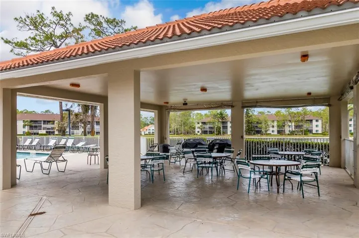 View of patio featuring a community pool