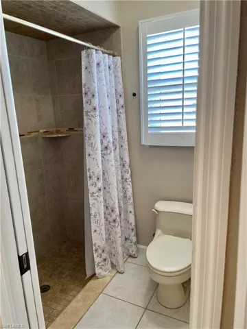 Water closet and walk in shower space is to the right.