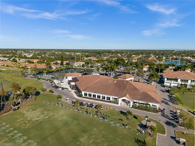 Aerial overview of property's location with nearby suburban area and a nearby body of water