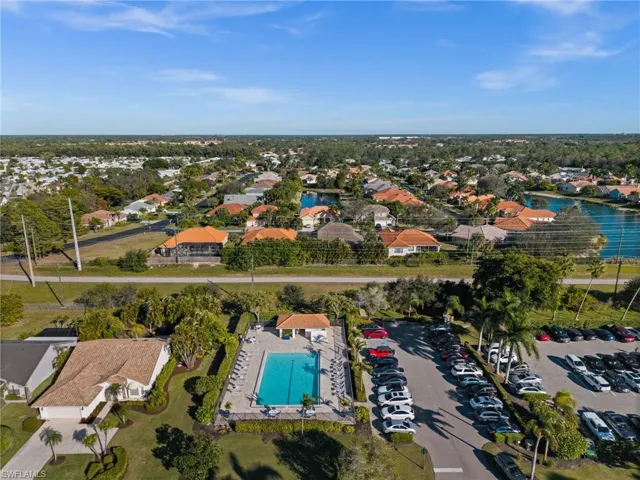 Aerial overview of property's location featuring nearby suburban area and a nearby body of water