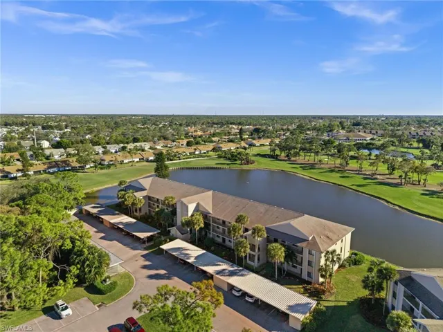 Aerial view of a golf course and a large body of water