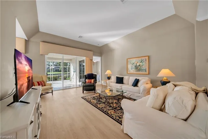 Living area with light wood-type flooring