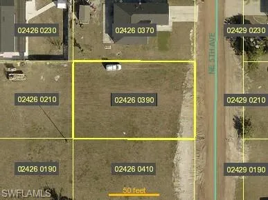 Aerial map of property and surrounding area featuring property parcel outlined