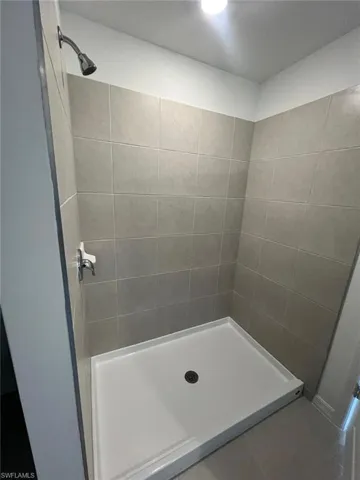 Bathroom featuring a stall shower