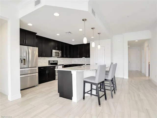 Kitchen With Hallway To Storage Closet, Guest Bathroom, Guest Bedroom, Laundry & Garage