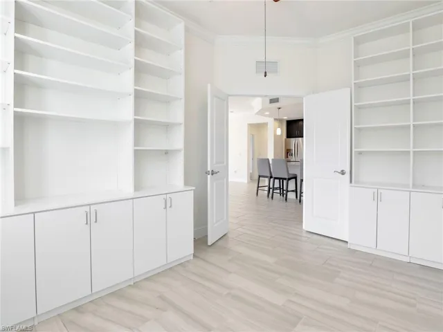 Built In Shelving & Cabinets In The Den
