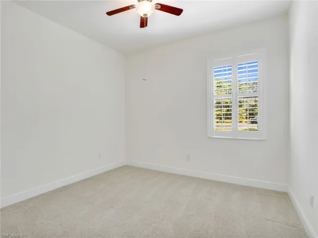 Guest Bedroom With Plantation Shutter