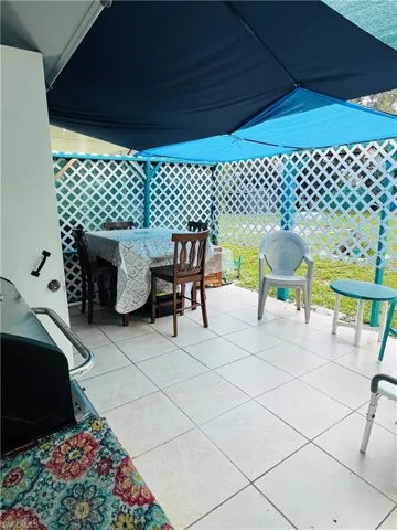 View of patio with outdoor dining space