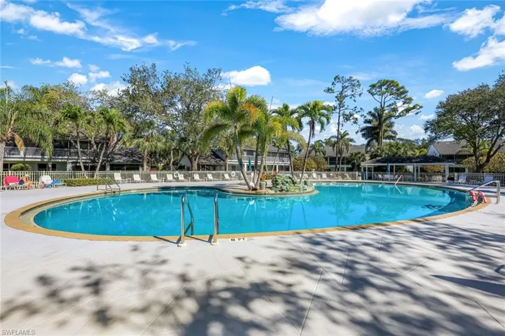 Community pool with waterfall
