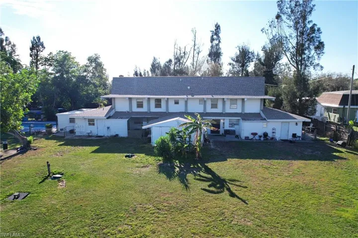 View of front of property with a front yard