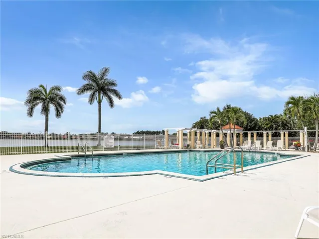 Community pool featuring a patio area