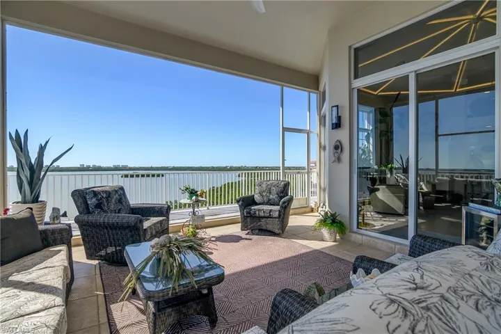 View of patio featuring a water view and an outdoor hangout area