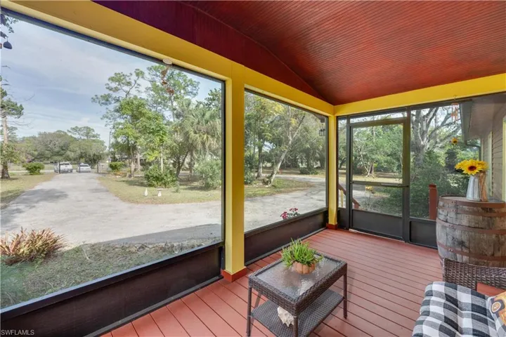 155 Evans Rd, LaBelle, FL 33935 Screened front porch looking out to gated entrance