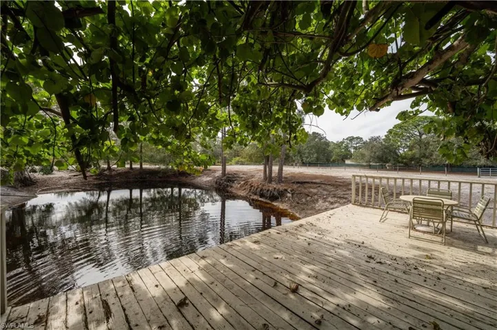155 Evans Rd, LaBelle, FL 33935 View of dock featuring a water view