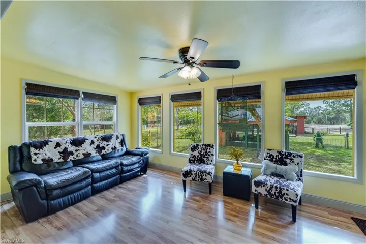155 Evans Rd, LaBelle, FL 33935 Sunroom featuring ceiling fan and a healthy amount of sunlight