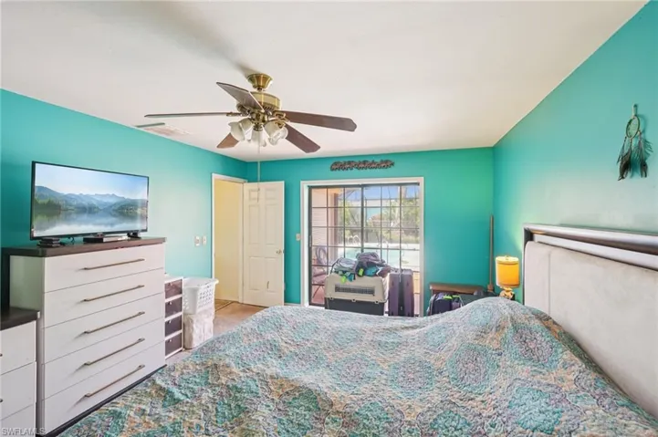 Bedroom featuring a ceiling fan