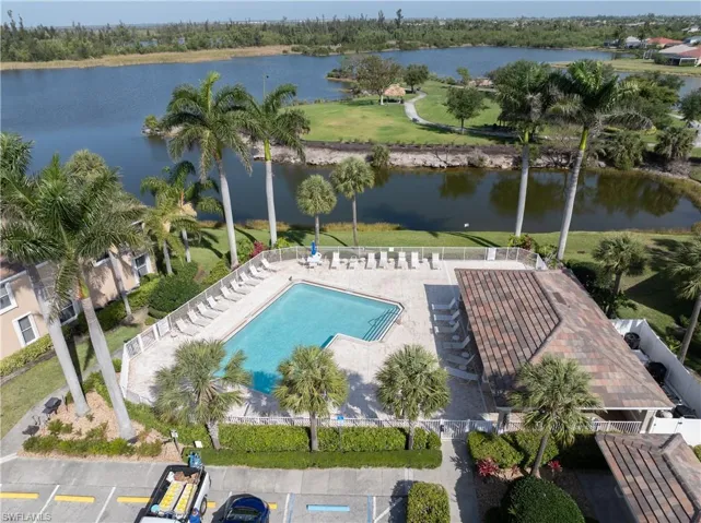 Bird's eye view of a large body of water and a pool area