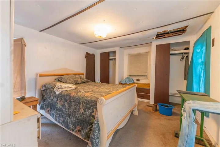 Bedroom featuring carpet floors