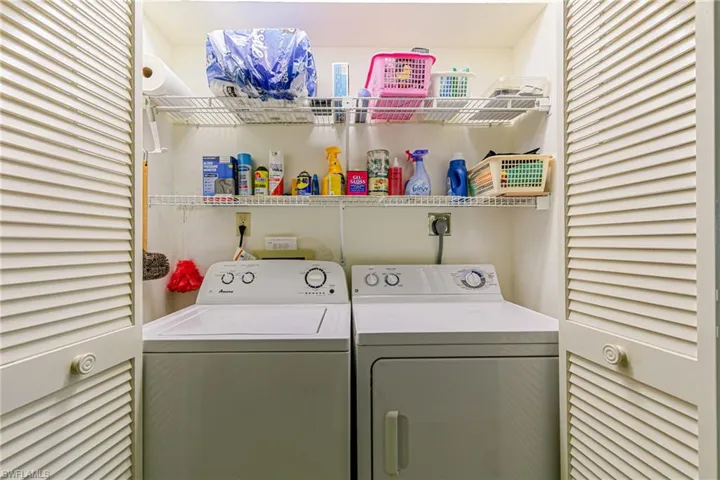 Laundry area featuring washer and clothes dryer