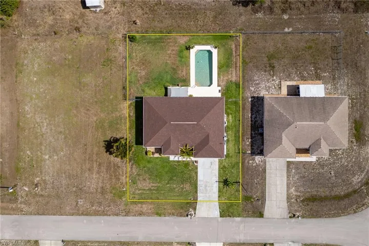 Aerial view of property's location featuring property parcel outlined