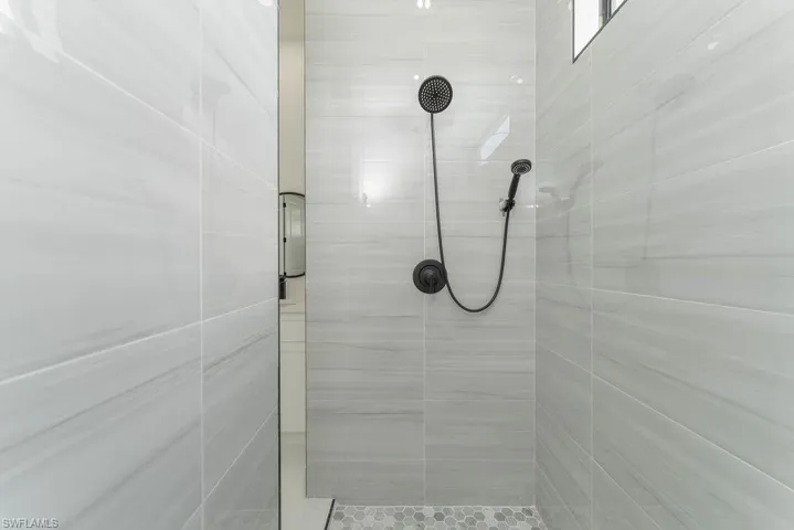 Bathroom with a tile shower