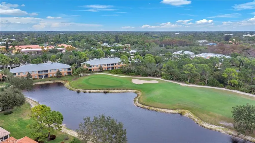 Bird's eye view of a golf club and a nearby body of water