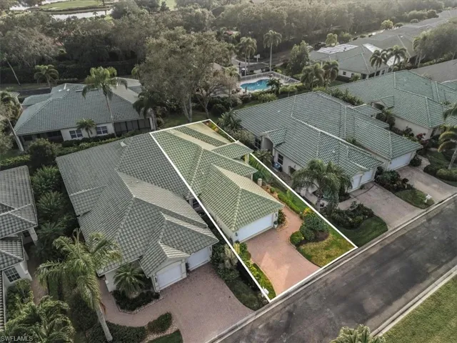 Aerial view of residential area with property boundaries highlighted