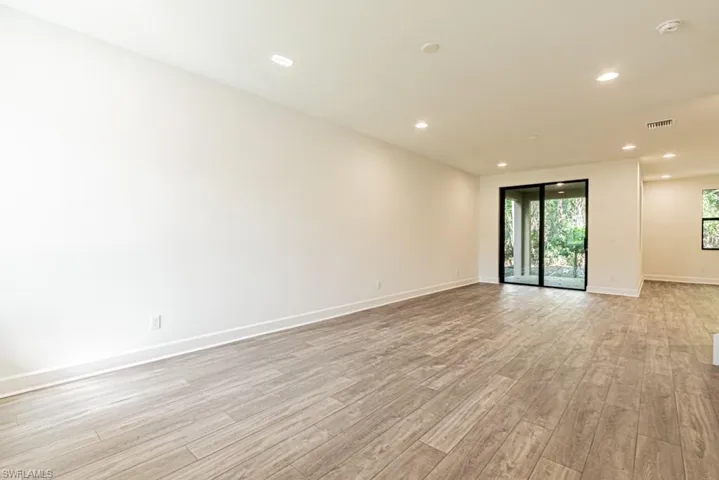 Spare room with light hardwood / wood-style floors
