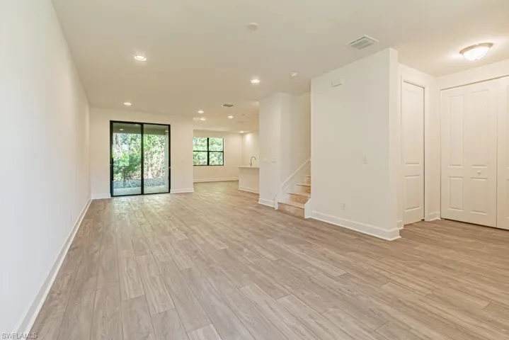 Unfurnished living room featuring light hardwood / wood-style floors