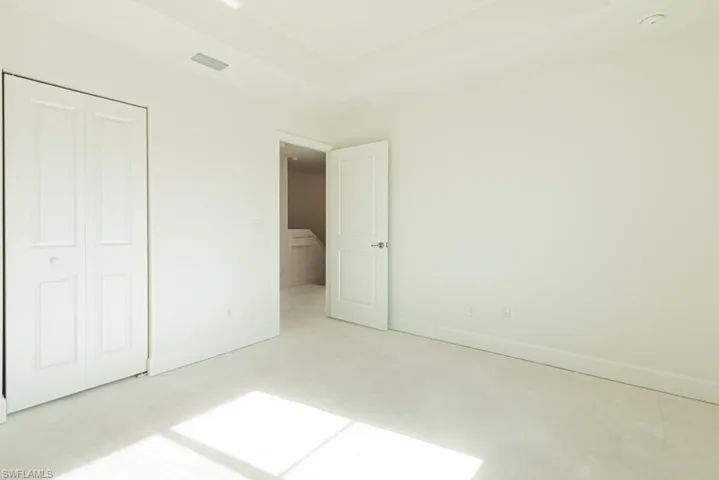 Unfurnished bedroom featuring a closet