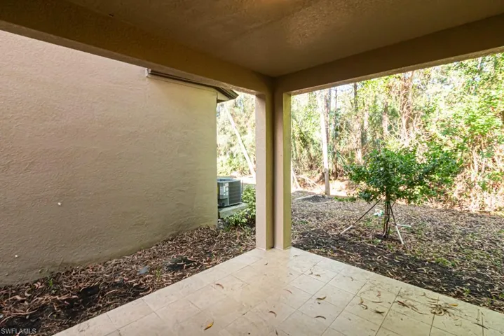 View of patio featuring central AC