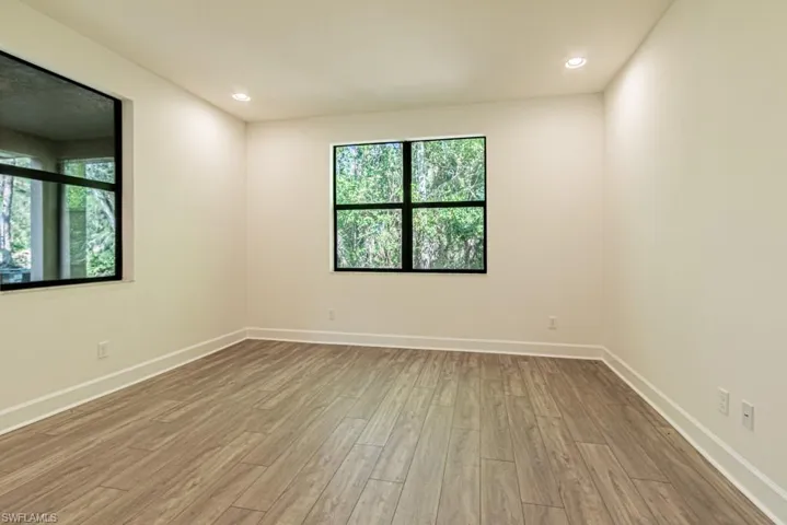 Empty room featuring light wood-type flooring