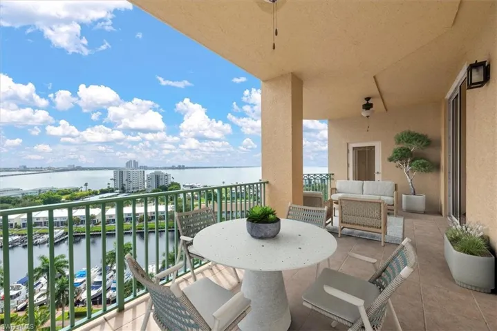 Balcony with a water view and outdoor lounge area