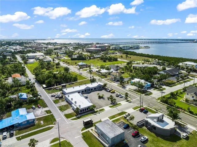 Drone / aerial view of a notable bridge and a nearby body of water