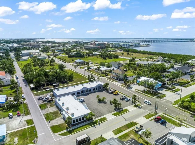 Bird's eye view of a notable bridge and a large body of water