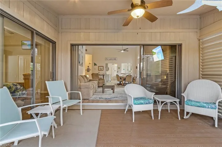 Sunroom with ceiling fan