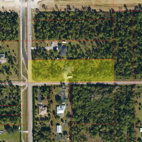 Aerial map of property and surrounding area featuring property boundaries highlighted
