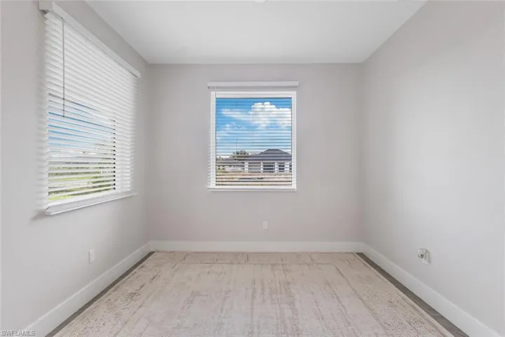Spare room featuring plenty of natural light