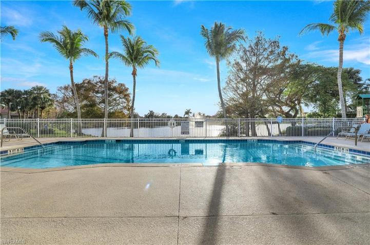 Community Pool overlooking the lake and fountain. Play ground is next door.