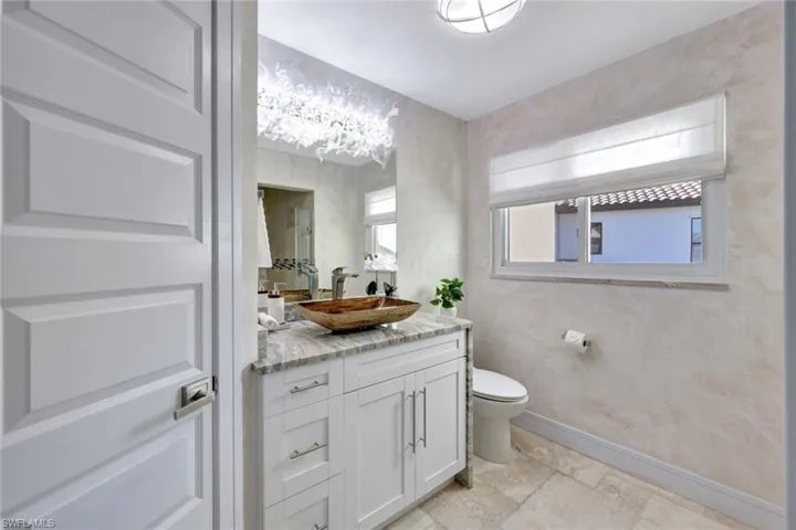 Bathroom with vanity and toilet