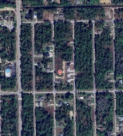 Aerial overview of property's location with property parcel outlined